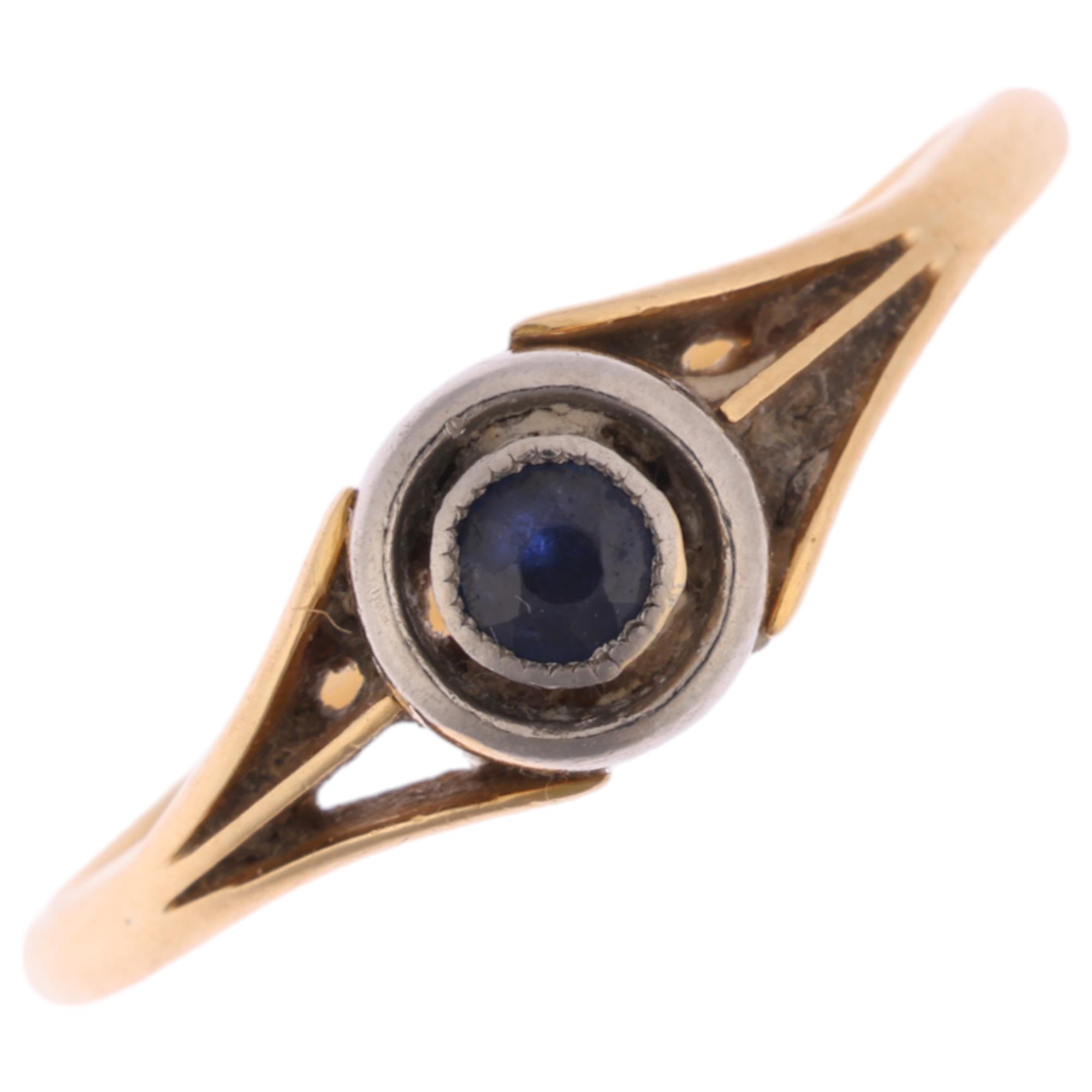 An Art Deco 18ct gold solitaire sapphire target ring, setting height 5.7mm, size N, 1.7g Condition