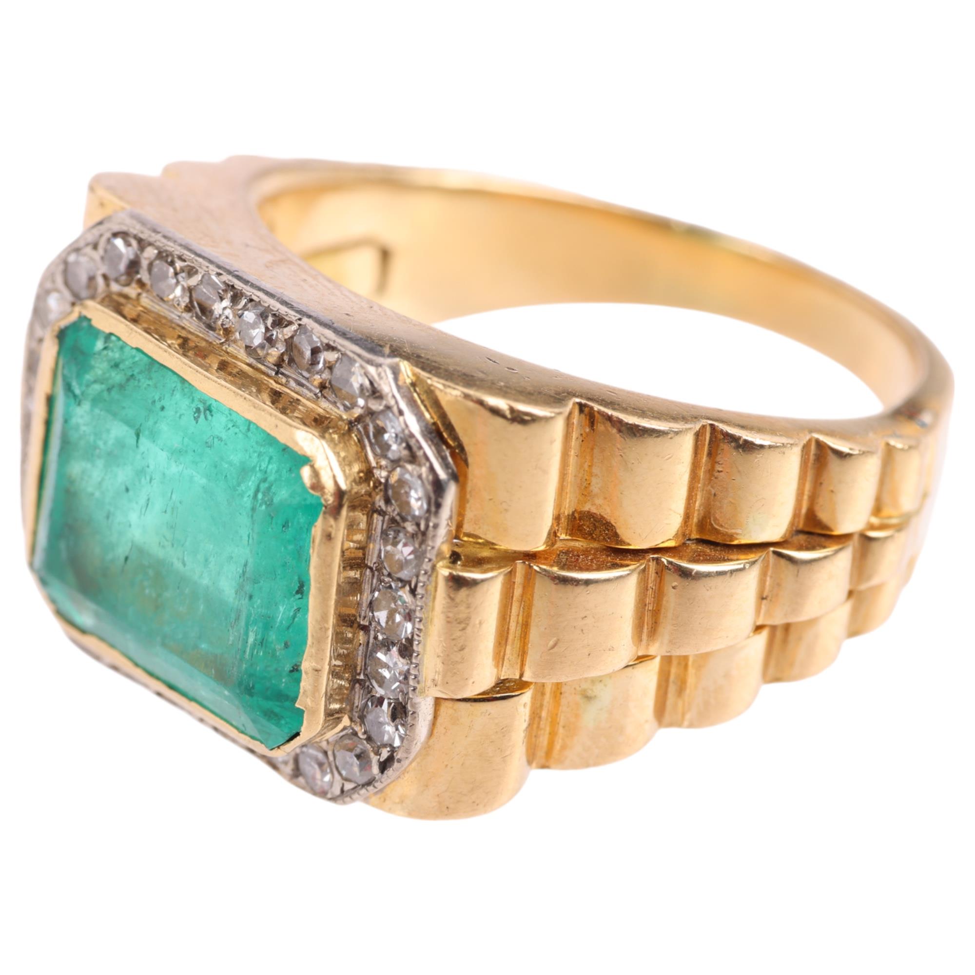 A large 18ct gold emerald and diamond cluster ring, rub-over set with 6.8ct octagonal step-cut - Image 2 of 4