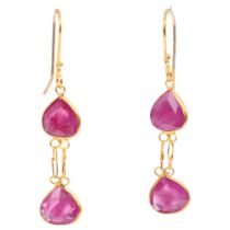 A pair of 18ct gold ruby drop earrings, set with pear-cut rubies, and shepherd hook fittings, 27.