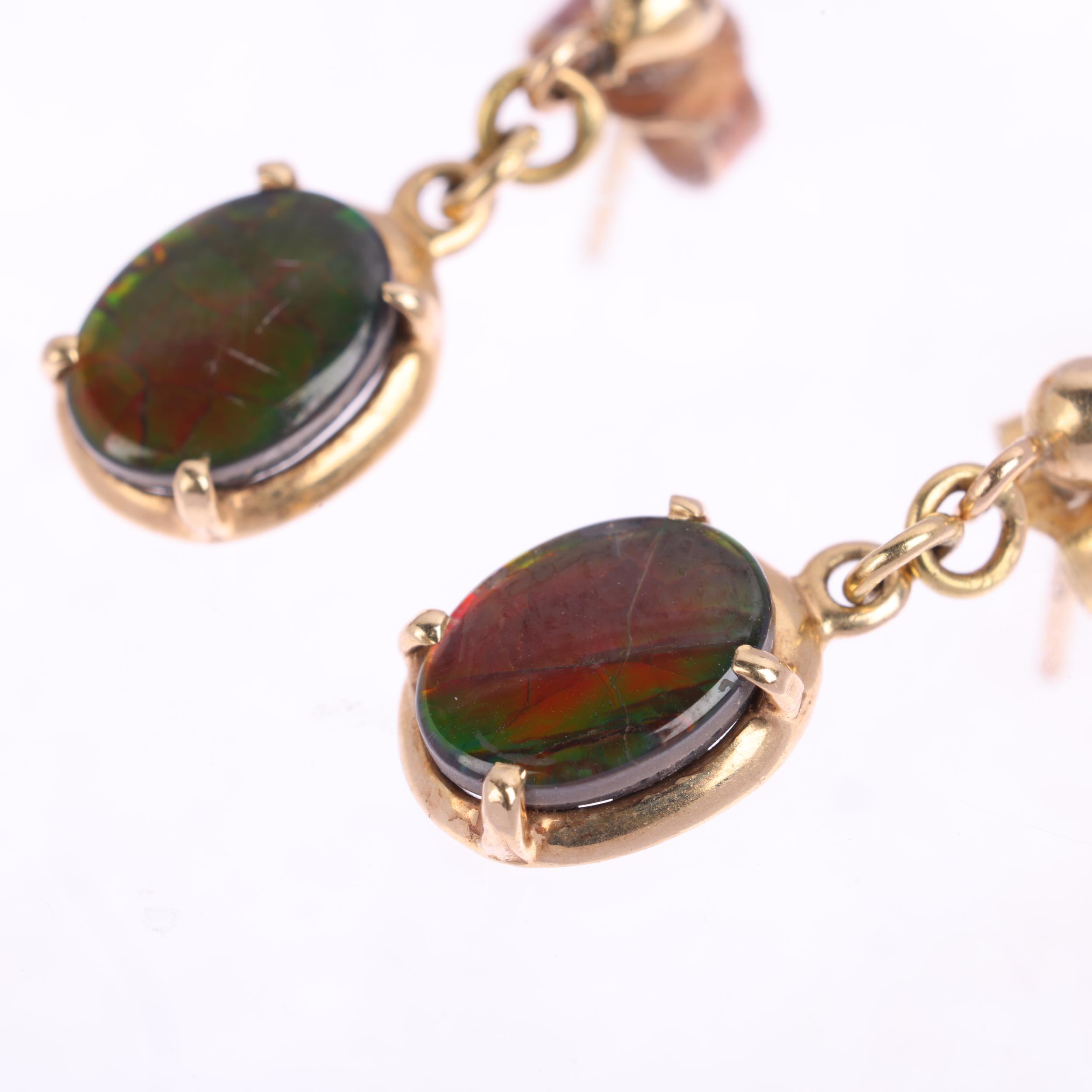 A pair of 14ct ammolite drop earrings, with stud fittings, 18.9mm, 1.5g Condition Report: No - Image 2 of 4