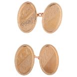 A pair of mid-20th century 9ct gold oval cufflinks, maker HG&S, Birmingham 1957, engine turned