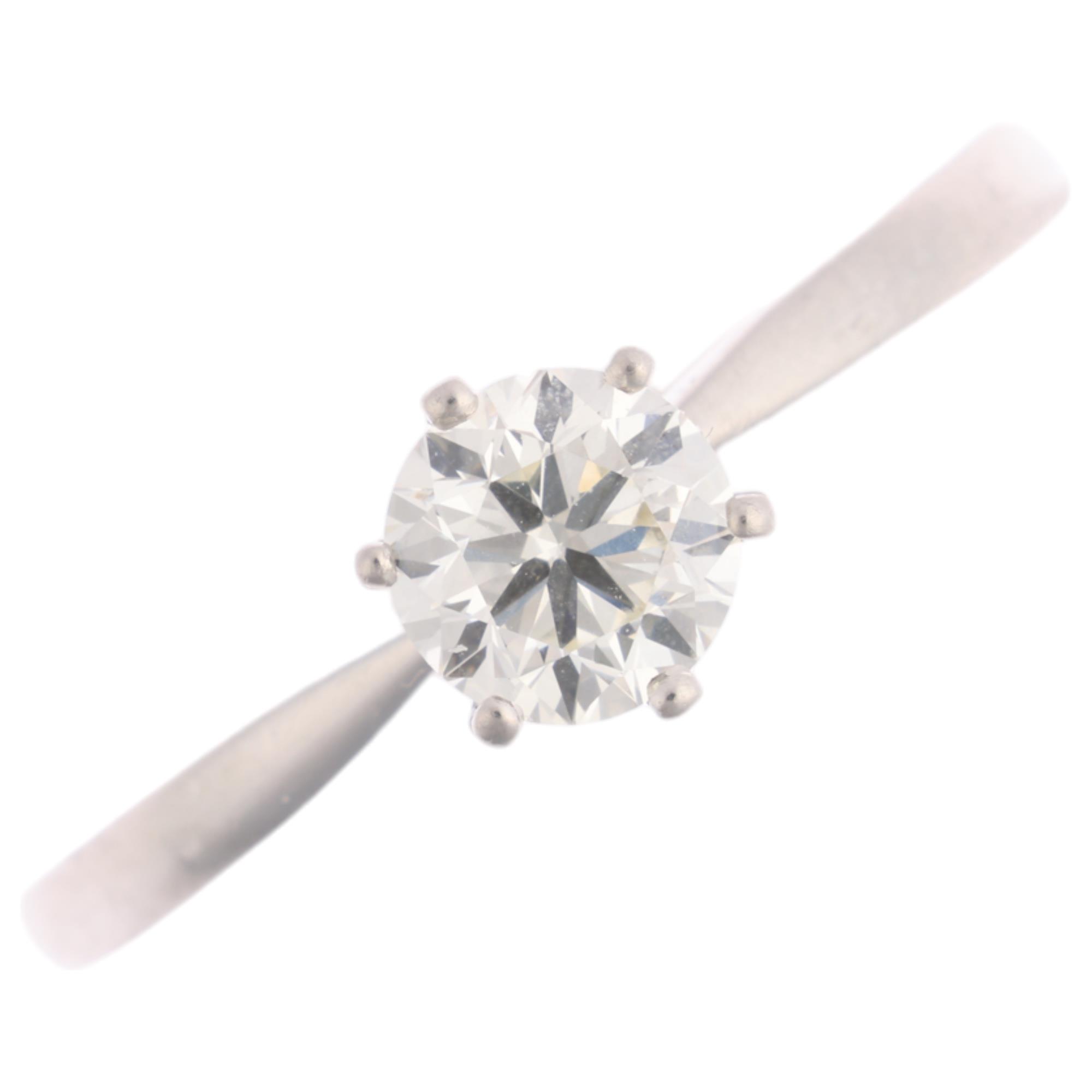 A platinum 0.7ct solitaire diamond ring, 6-claw set with modern round brilliant-cut diamond,