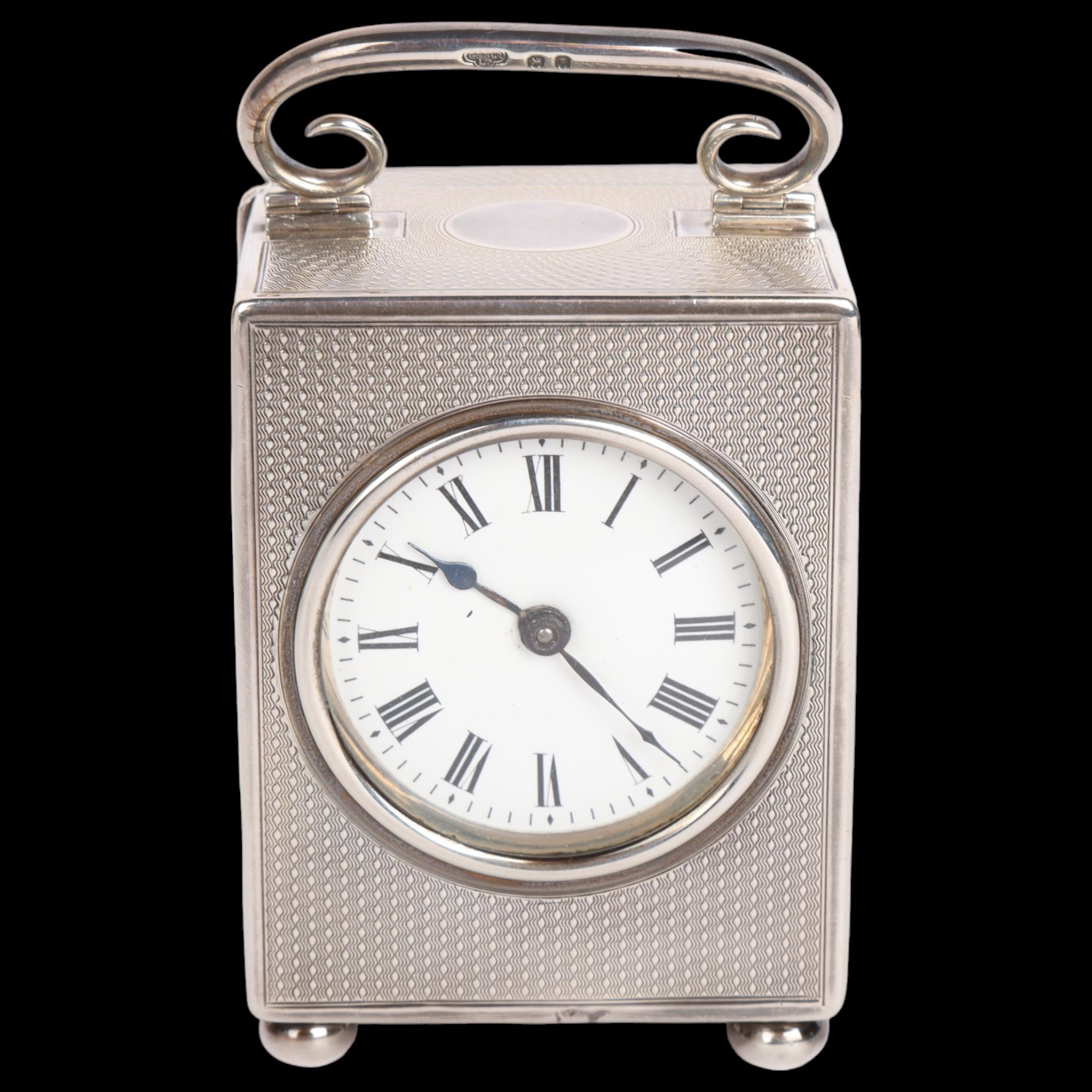 A George V silver carriage clock, Goldsmiths & Silversmiths Co Ltd, London 1918, rectangular form
