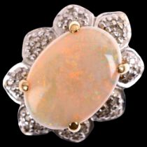 A 9ct gold opal and diamond flowerhead cluster ring, maker DK, Birmingham 2008, claw set with oval