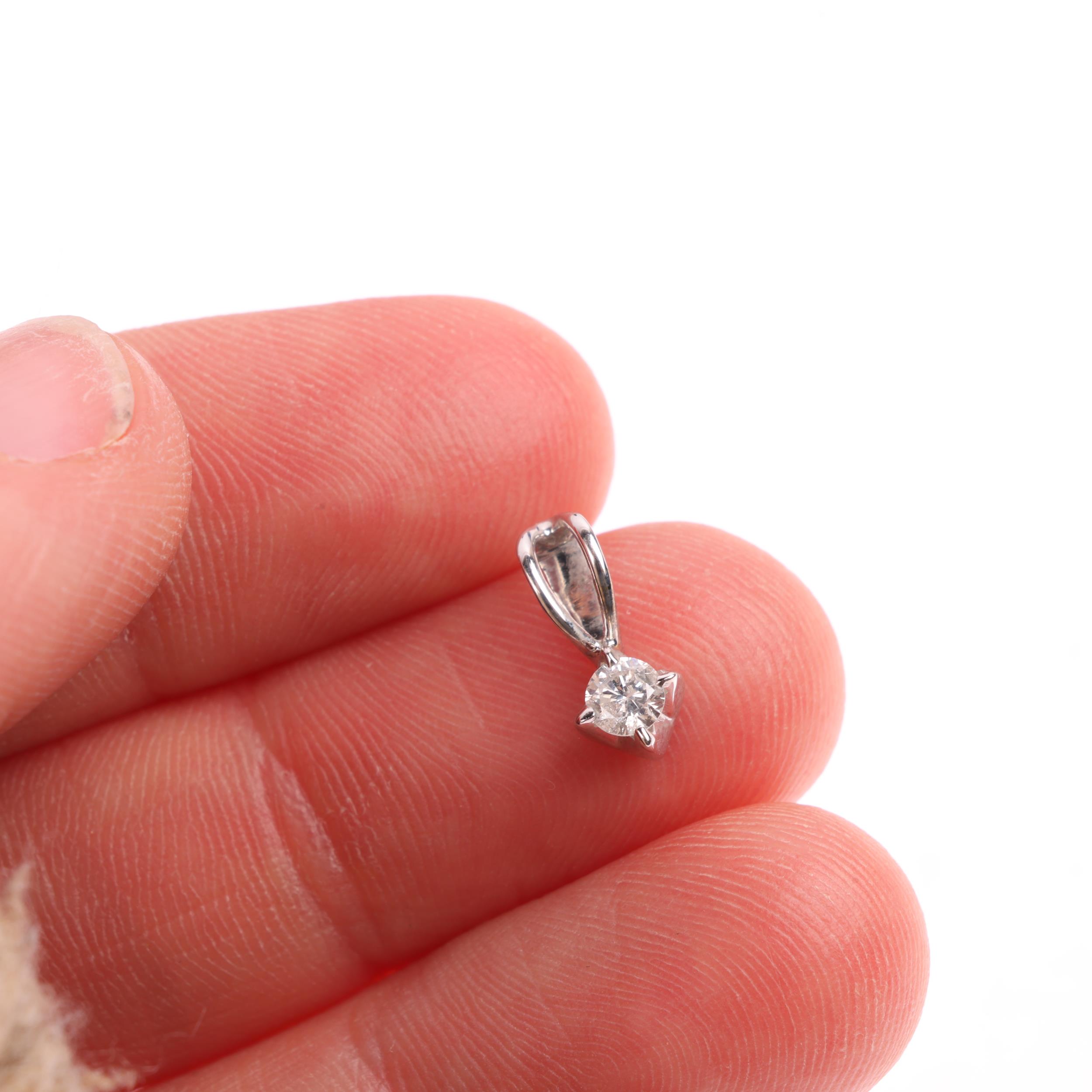 A 9ct white gold 0.15ct solitaire diamond pendant, claw set with modern round brilliant-cut diamond, - Image 4 of 4