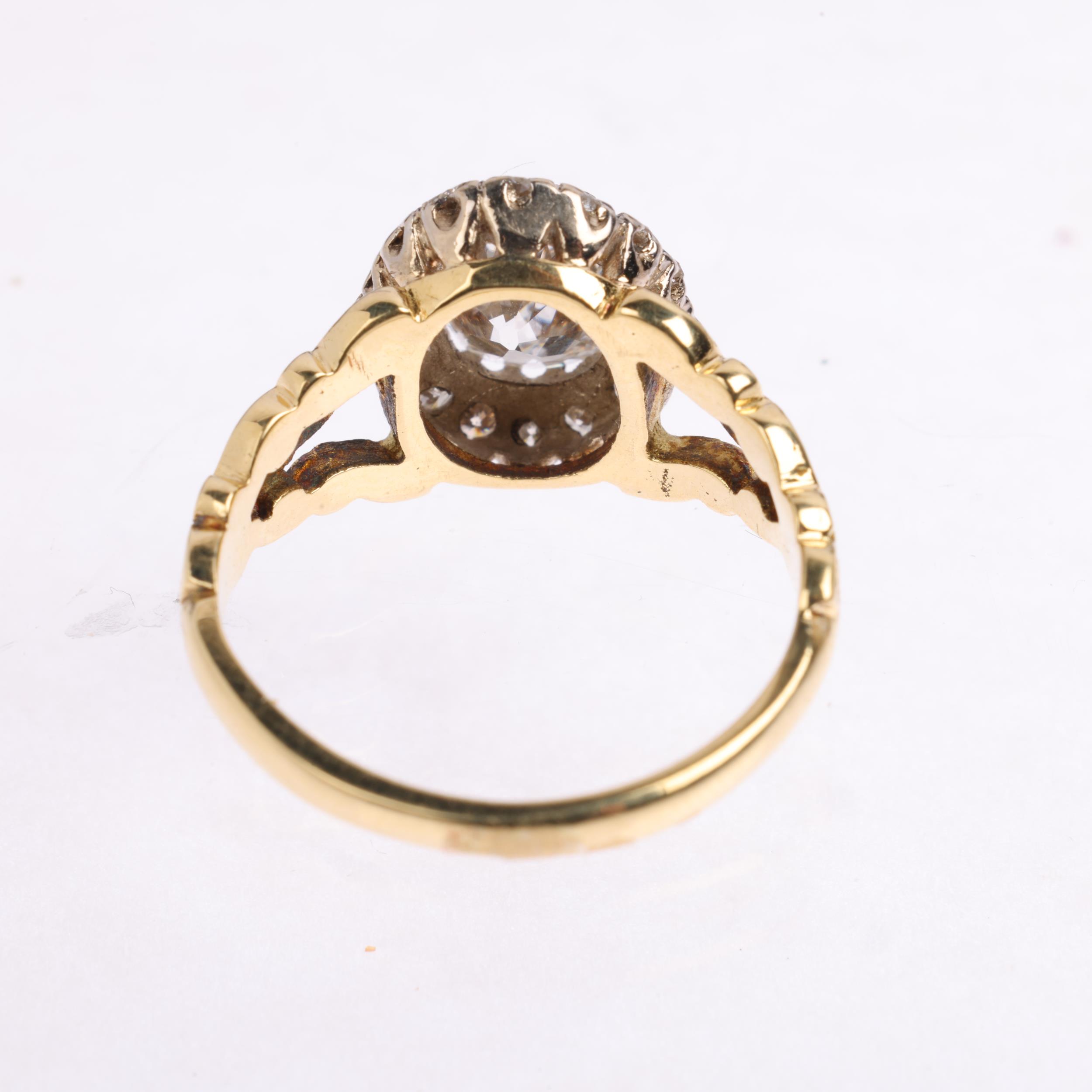 An 18ct gold 1.35ct lab grown diamond cluster ring, centrally claw set with 1.3ct oval mixed-cut lab - Image 3 of 4