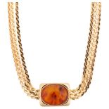 CHRISTIAN DIOR - a Vintage gold plated Bakelite necklace, on multi-strand serpentine link chain,