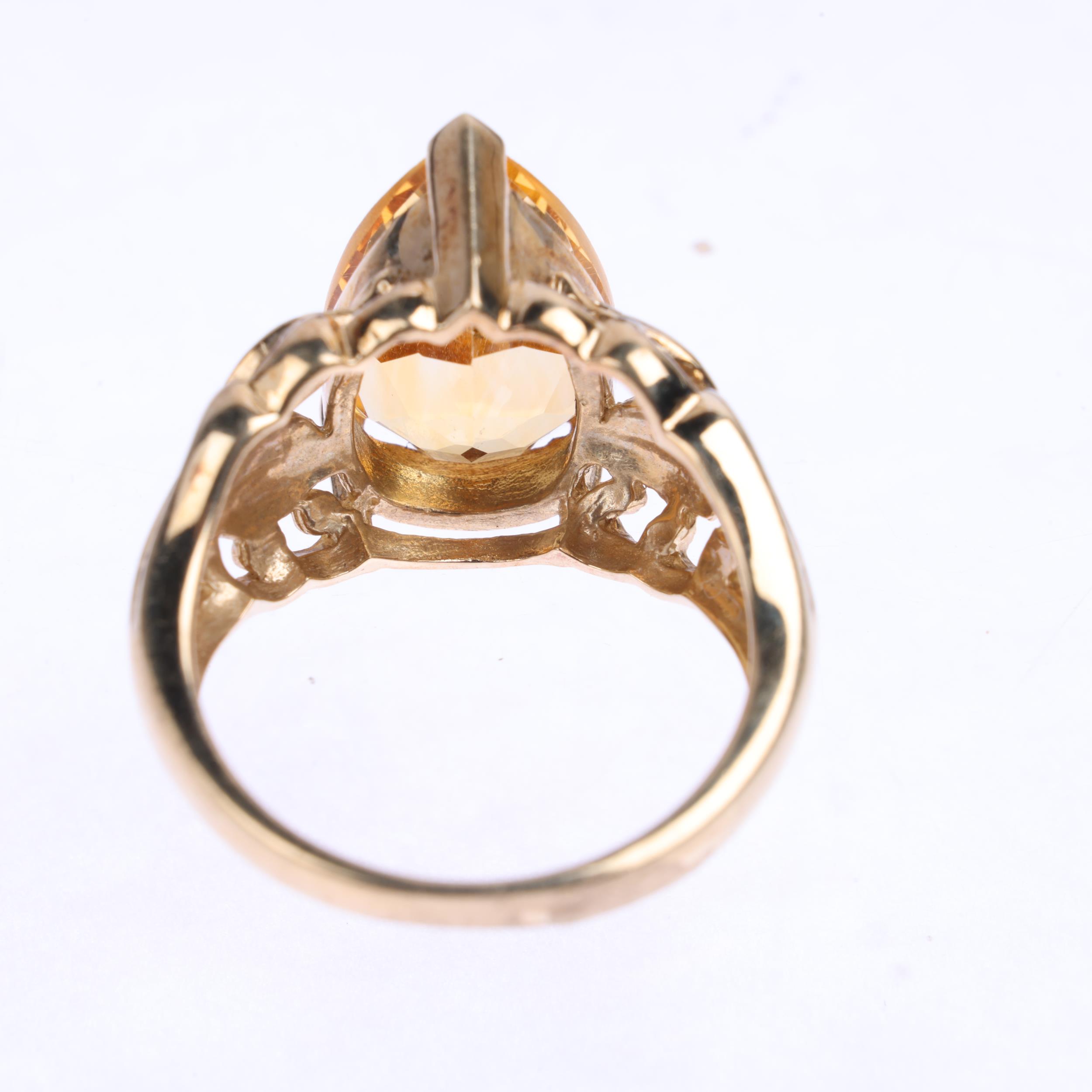 A 9ct gold citrine dress ring, maker GTV, Birmingham 2005, set with pear-cut citrine and floral - Image 3 of 4