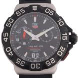TAG HEUER - a stainless steel Formula 1 Alarm quartz calendar wristwatch, ref. WAH111A, black dial