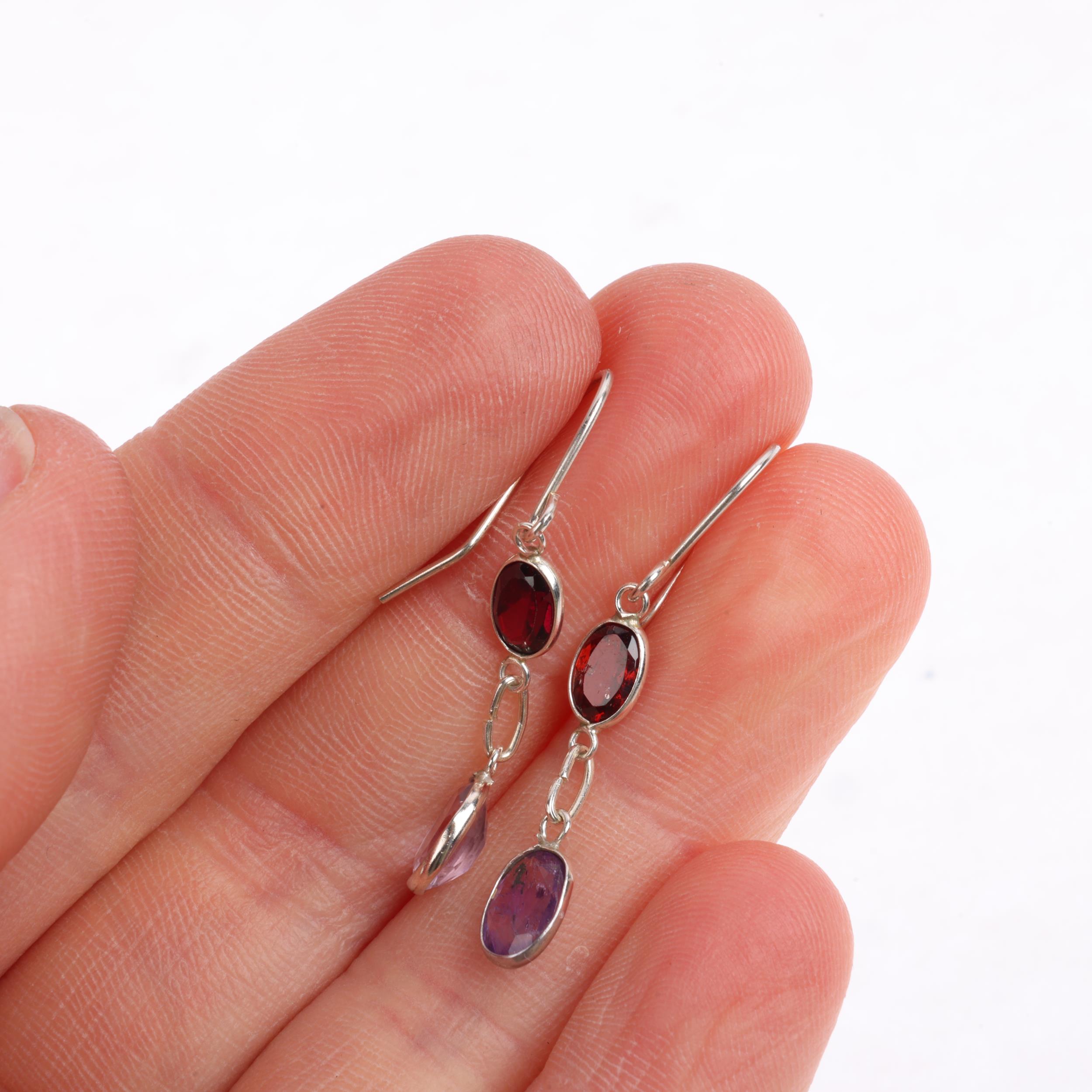 A pair of silver amethyst and garnet drop earrings, with stud fittings, 34.3mm, 1g Condition Report: - Image 3 of 3