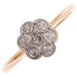 An 18ct gold diamond flowerhead cluster ring, platinum-topped set with old-cut diamonds, total