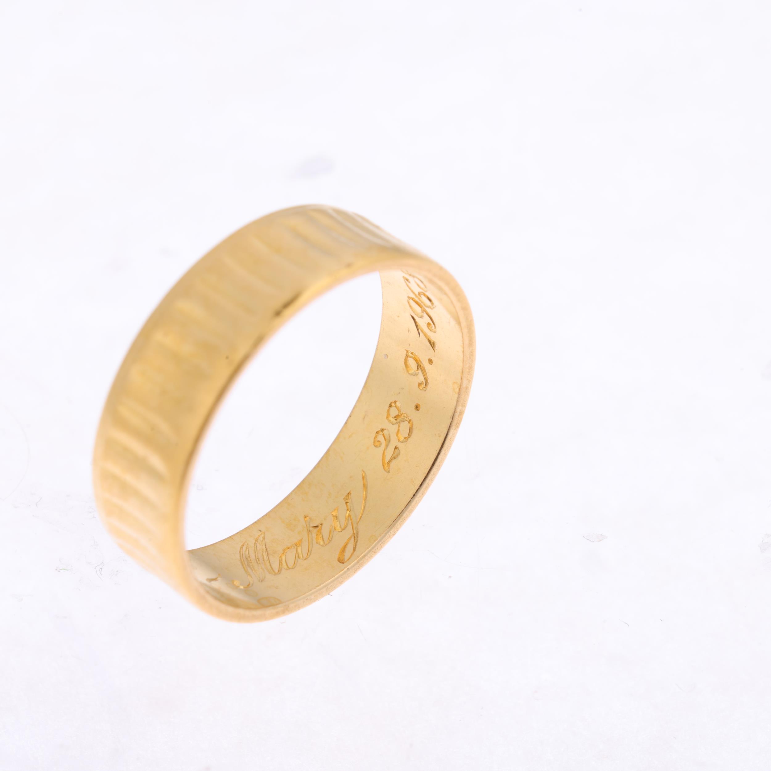 A mid-20th century 22ct gold wedding band ring, maker S&W, London 1960, engraved decoration, band - Image 2 of 4