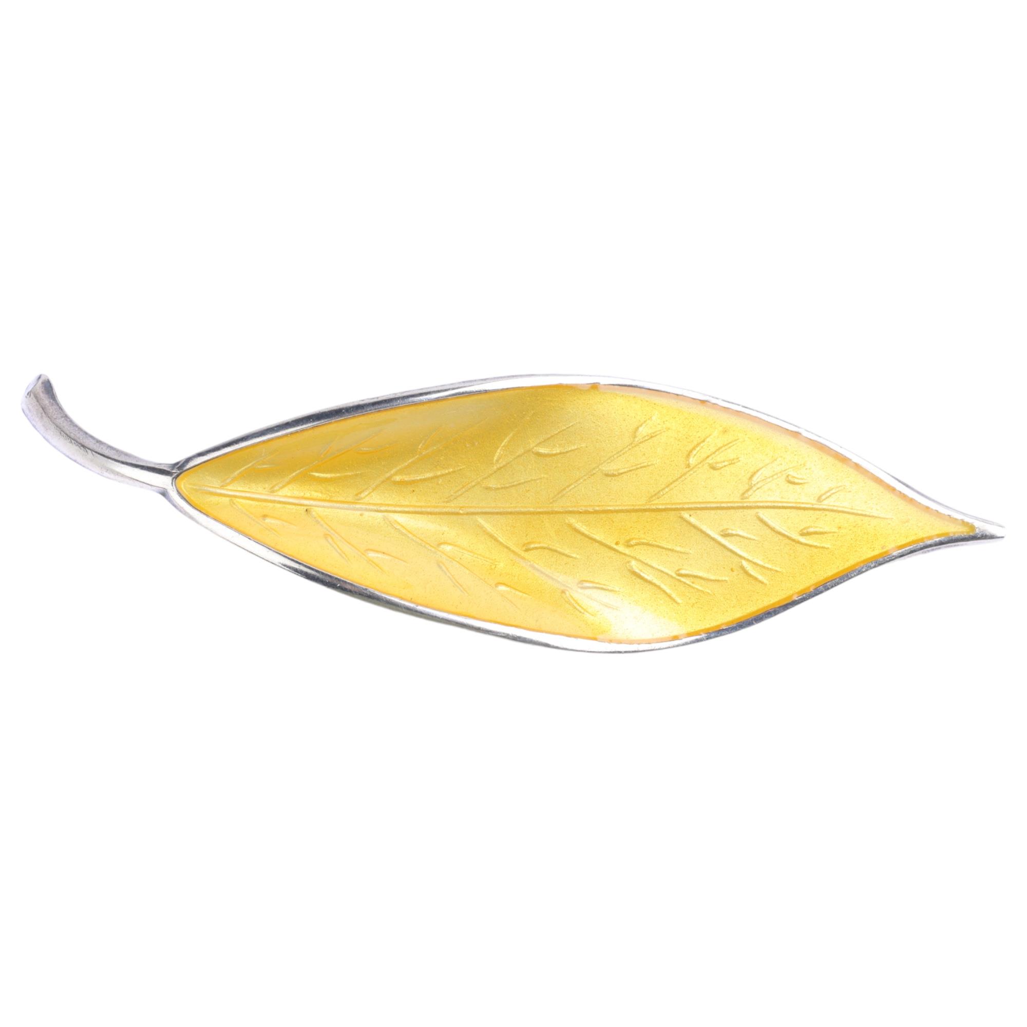 DAVID ANDERSEN - a Norwegian modernist sterling silver and yellow enamel leaf brooch, 68.9mm, 8.6g