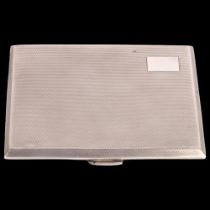 An Elizabeth II silver cigarette case, WT Toghill & Co, Birmingham 1956, rectangular form with