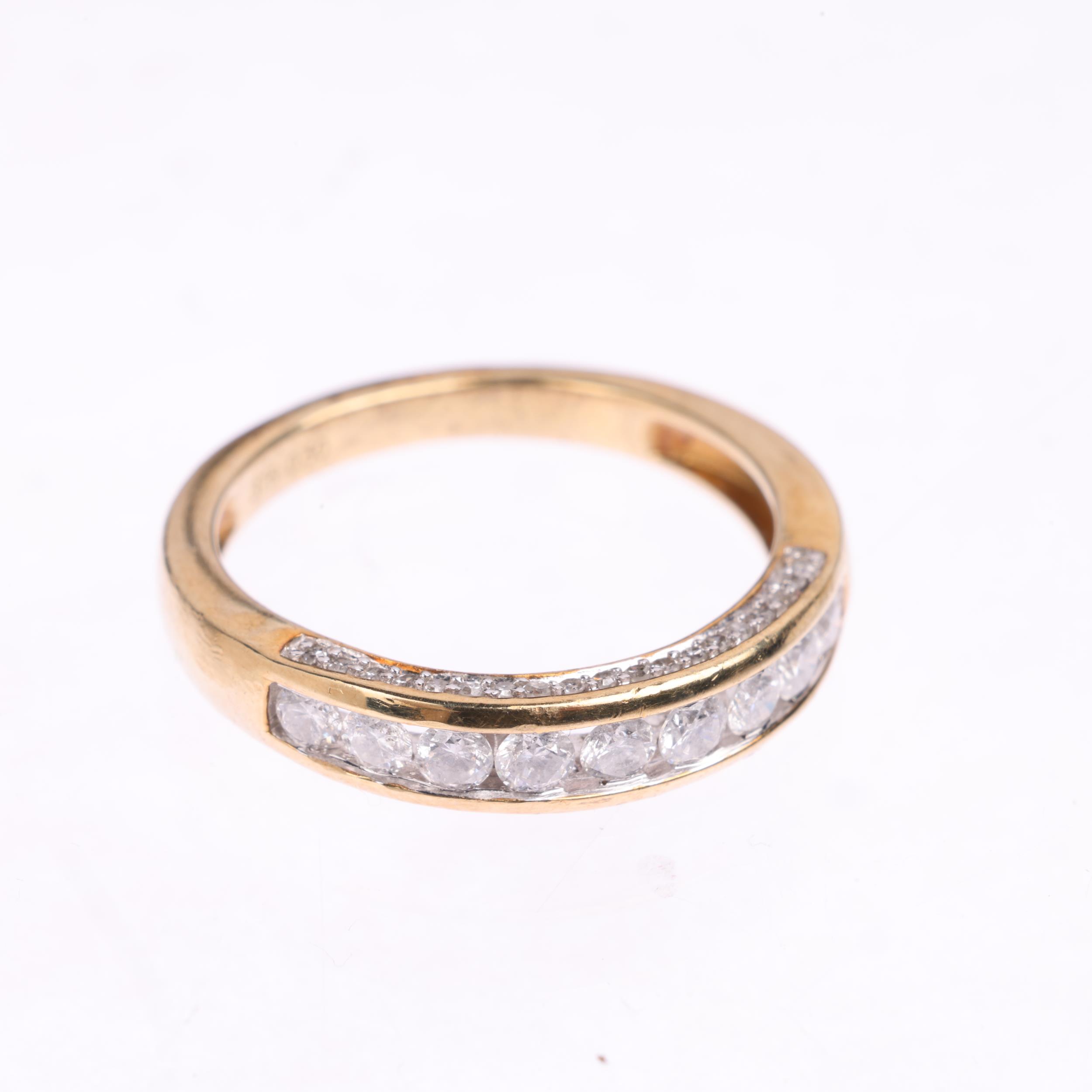 A modern 9ct gold half eternity ring, channel set with modern round brilliant-cut diamonds, total - Image 3 of 4