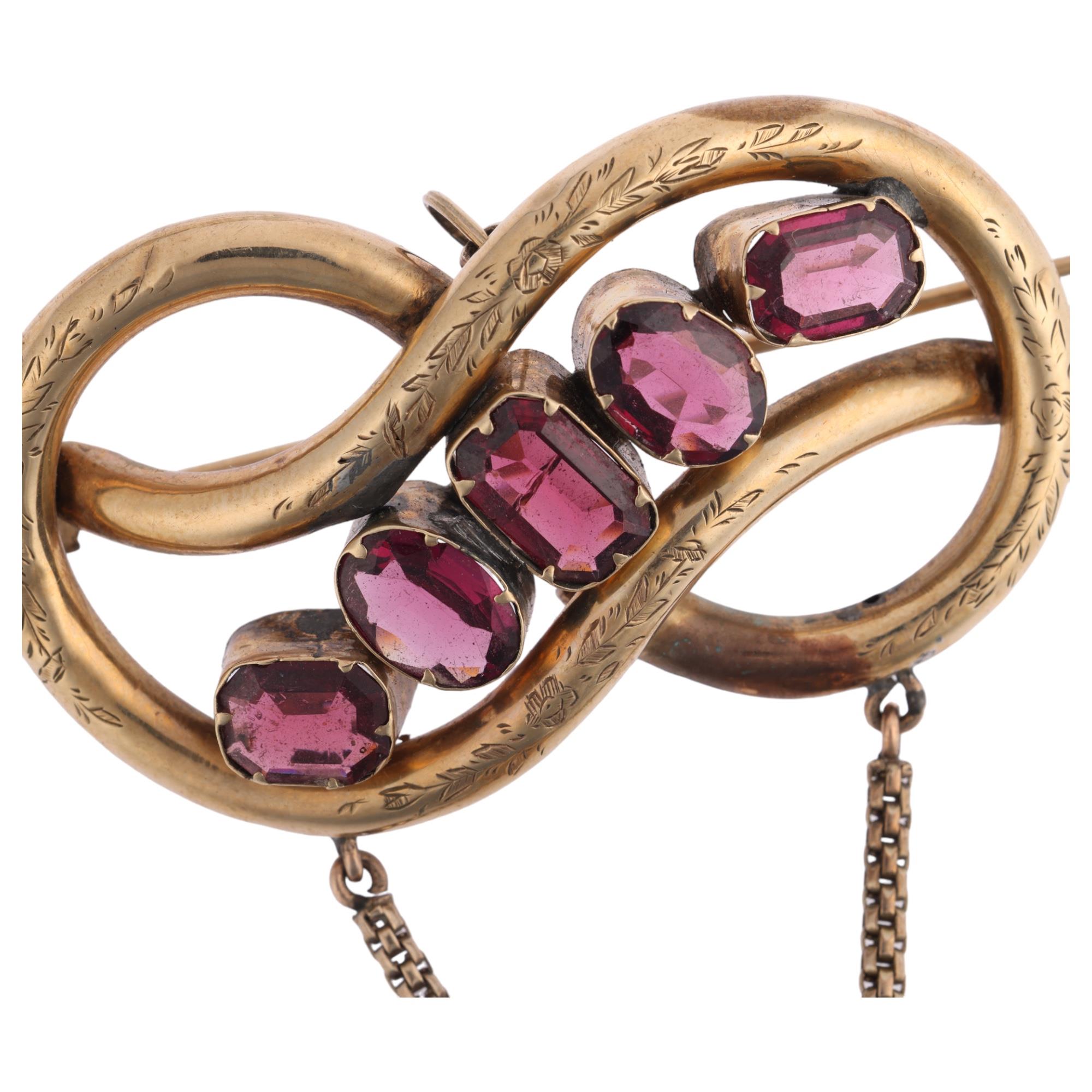 A large Victorian garnet knot drop brooch, circa 1860, set with vari-cut garnets, apparently - Image 2 of 4