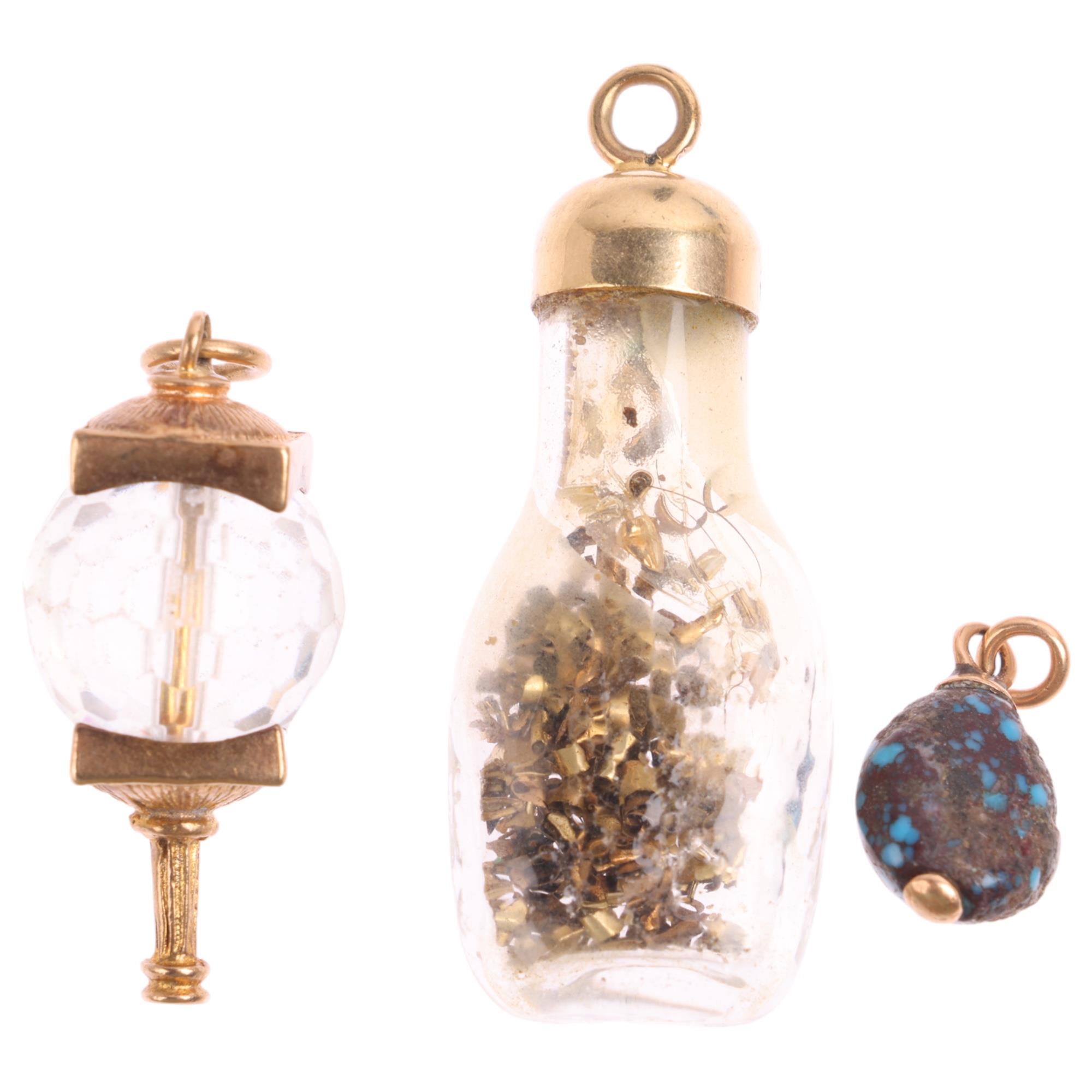 3 gold-mounted charms, including vial example, with gold shavings, 36.5mm (3) Condition Report: