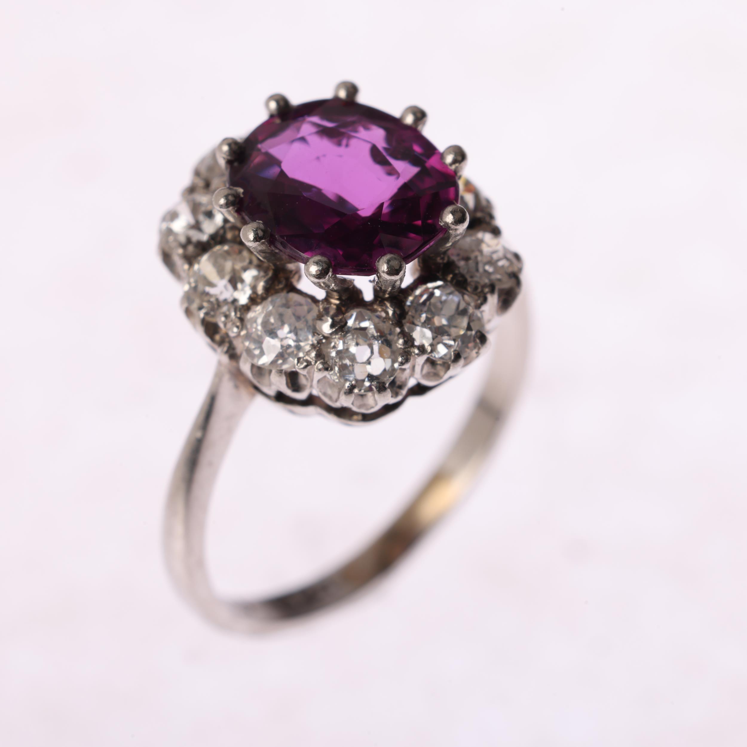 A platinum synthetic ruby and diamond flowerhead cluster ring, claw set with oval mixed-cut - Image 2 of 4