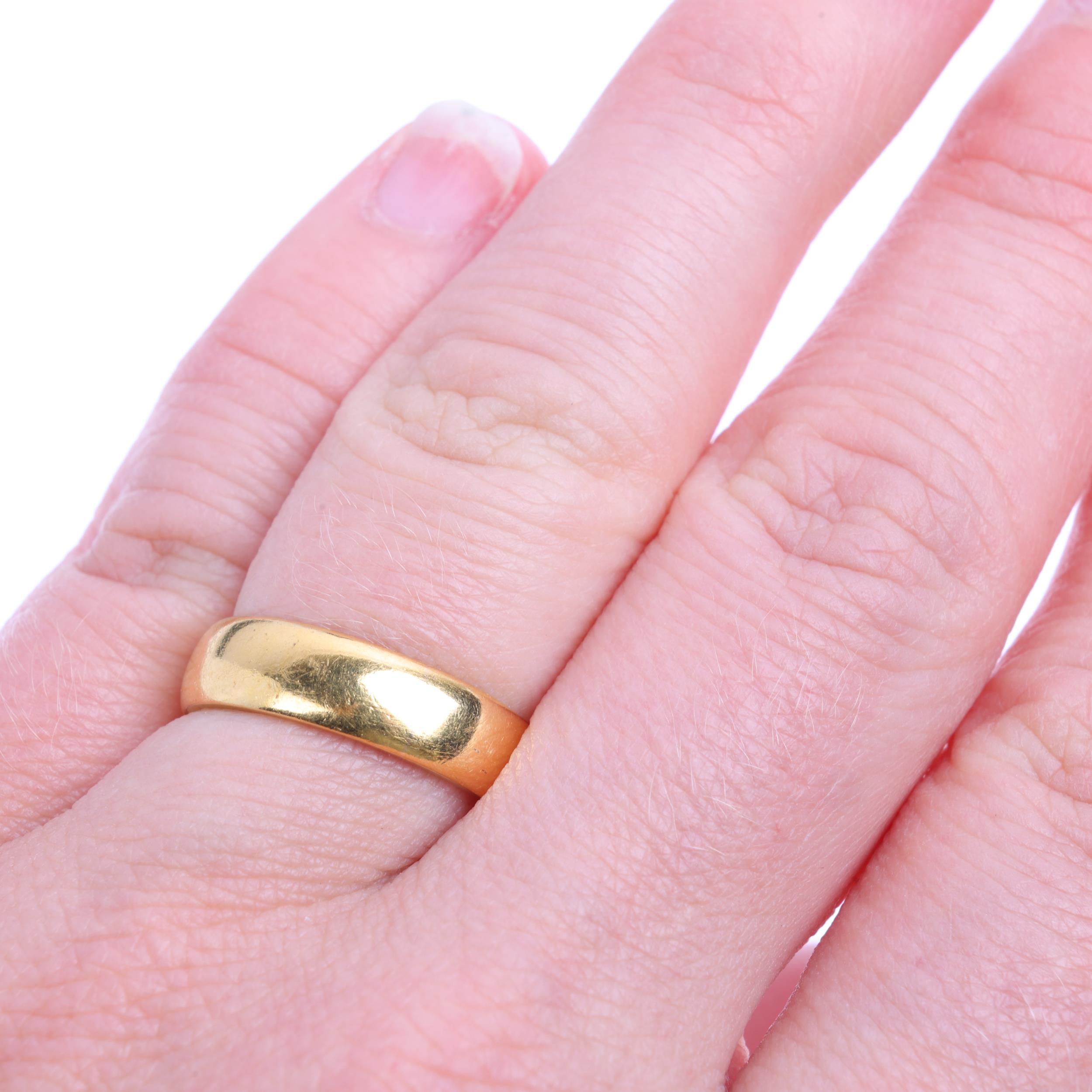 A 22ct gold wedding band ring, no London date letter, band width 5.1mm, size L, 6.6g Condition - Image 4 of 4