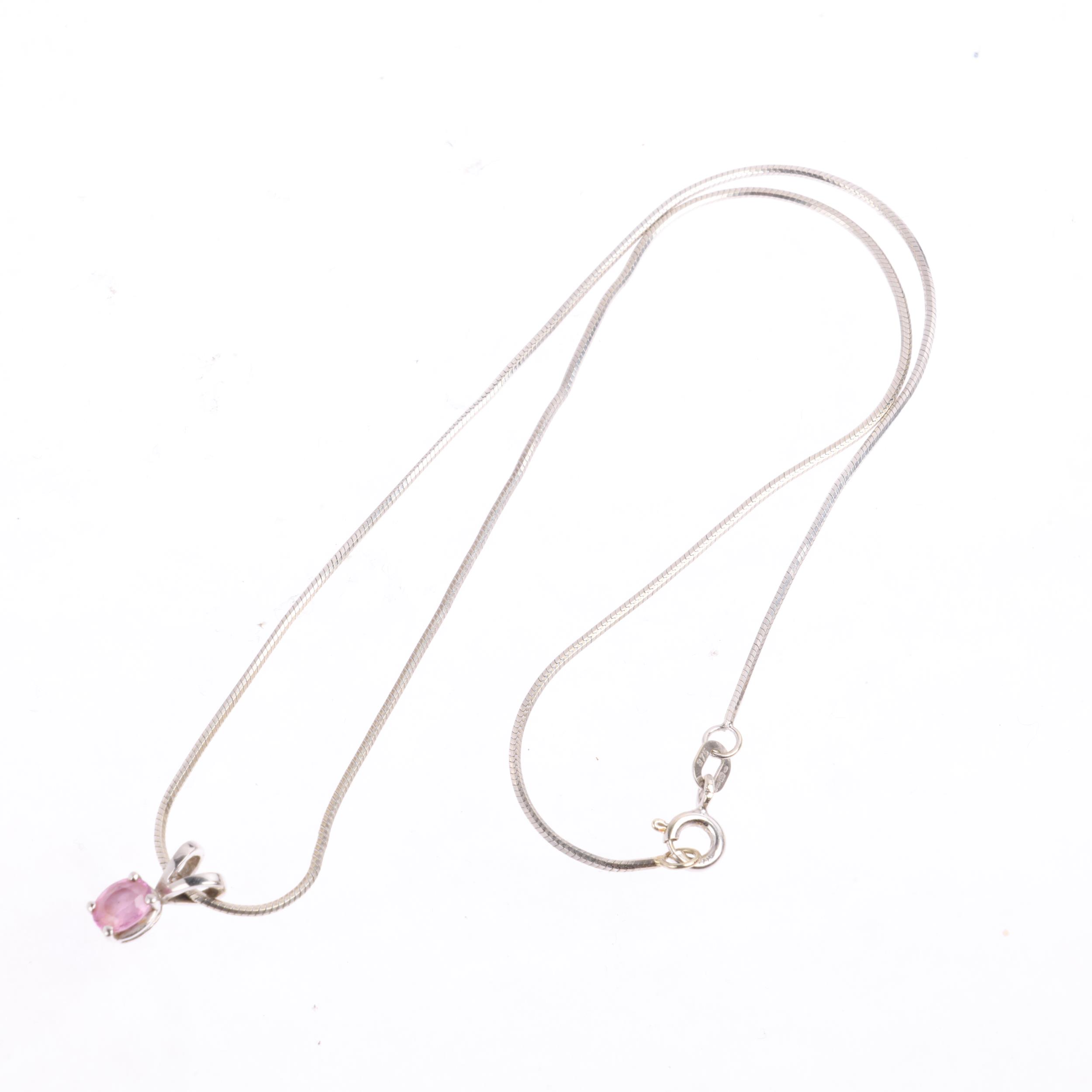 A 9ct white gold pink sapphire pendant necklace, on 9ct herringbone link chain, pendant 10.9mm, - Image 2 of 3