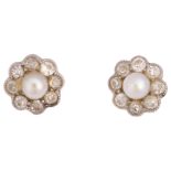 A pair of whole cultured pearl and diamond flowerhead cluster earrings, with stud fittings, 7.3mm,