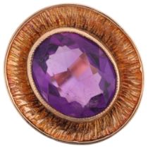 A 1970s 9ct gold amethyst dress ring, maker CG&S, Birmingham 1974, panel rub-over set with oval