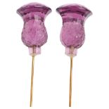 A pair of amethyst coloured glass thistle hatpins, 17cm, 12.8g Condition Report: A few tiny edge