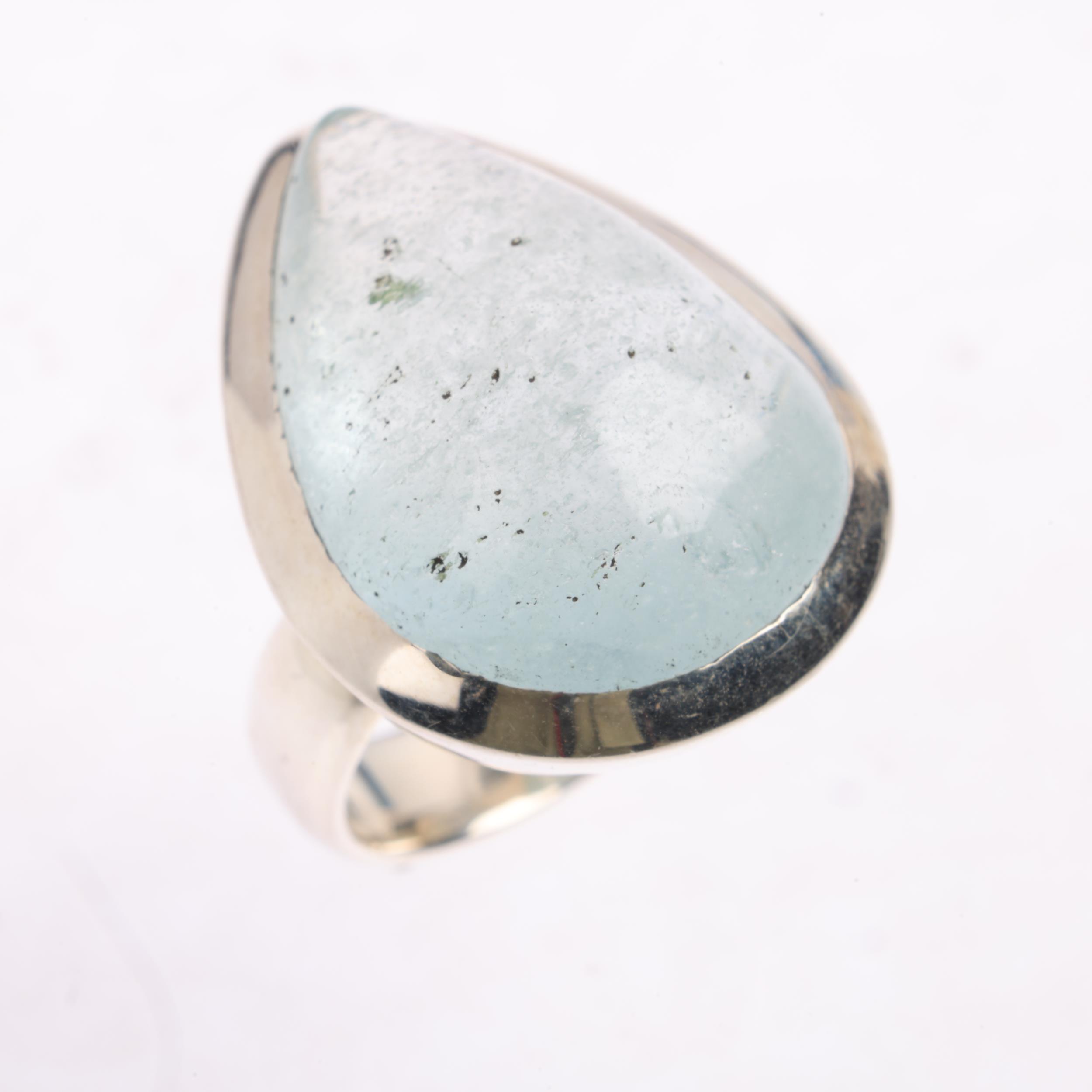 A large sterling silver aquamarine dress ring, set with pear cabochon aquamarine, setting height - Image 2 of 3