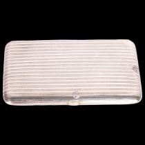 A large Portuguese silver cigarette case, circa 1900, rectangular form with ribbed decoration and