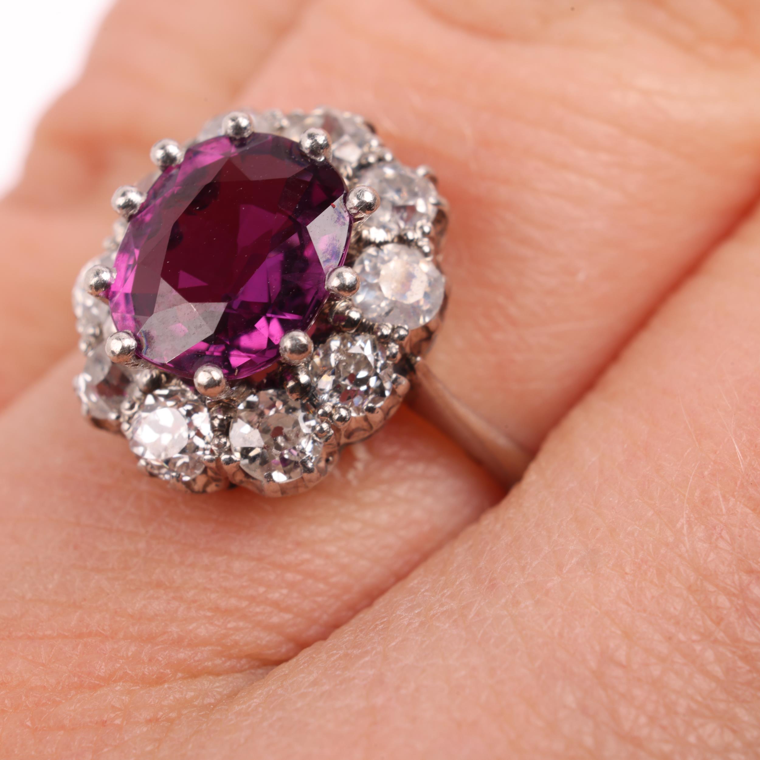 A platinum synthetic ruby and diamond flowerhead cluster ring, claw set with oval mixed-cut - Image 4 of 4