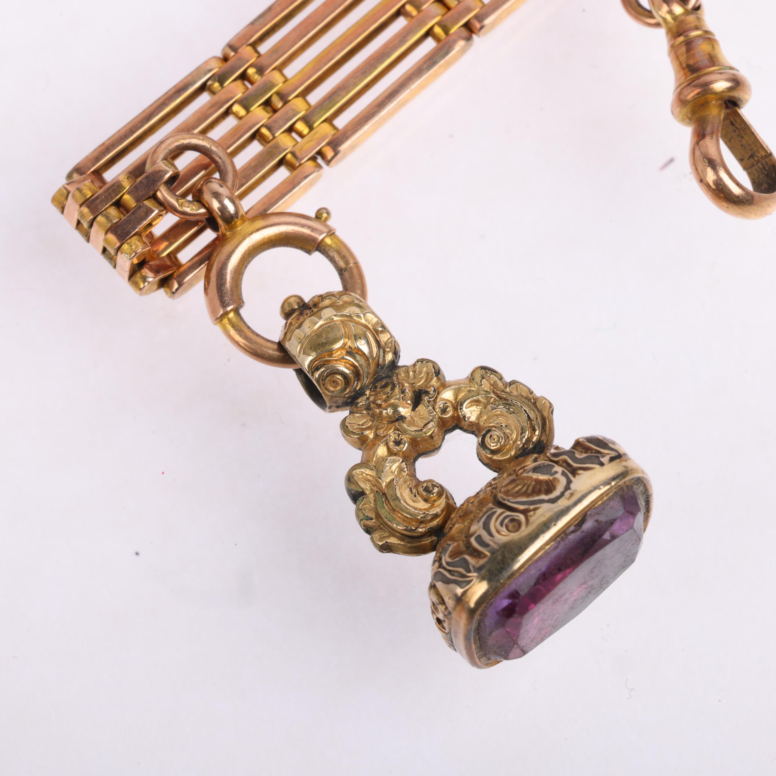 An Antique 9ct rose gold short gatelink fob chain, with gilt-metal fob and unmarked yellow metal dog - Image 3 of 4