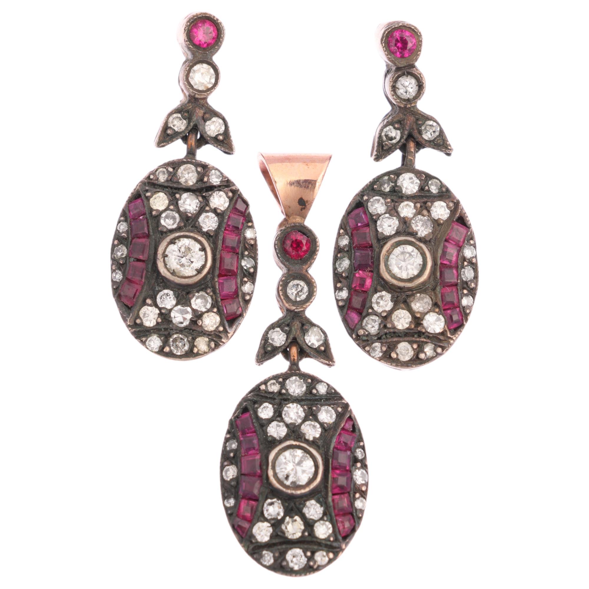 A modern ruby and diamond geometric panel pendant and earring set, in the Art Deco style, set with