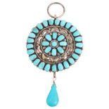 A large Native American Navajo turquoise drop pendant, unmarked silver closed-back settings,