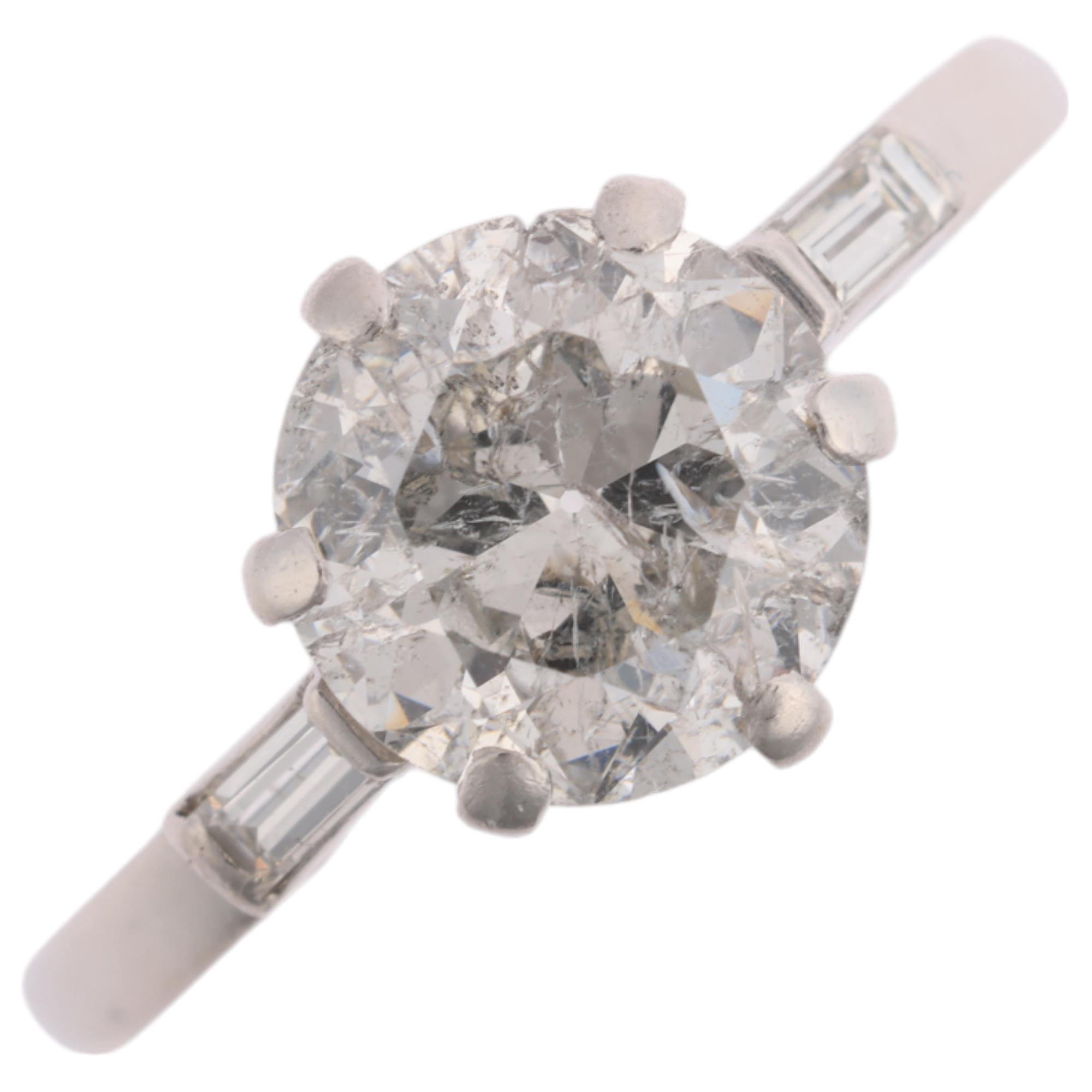 A 1.7ct solitaire diamond ring, centrally claw set with 1.7ct modern round brilliant-cut diamond,