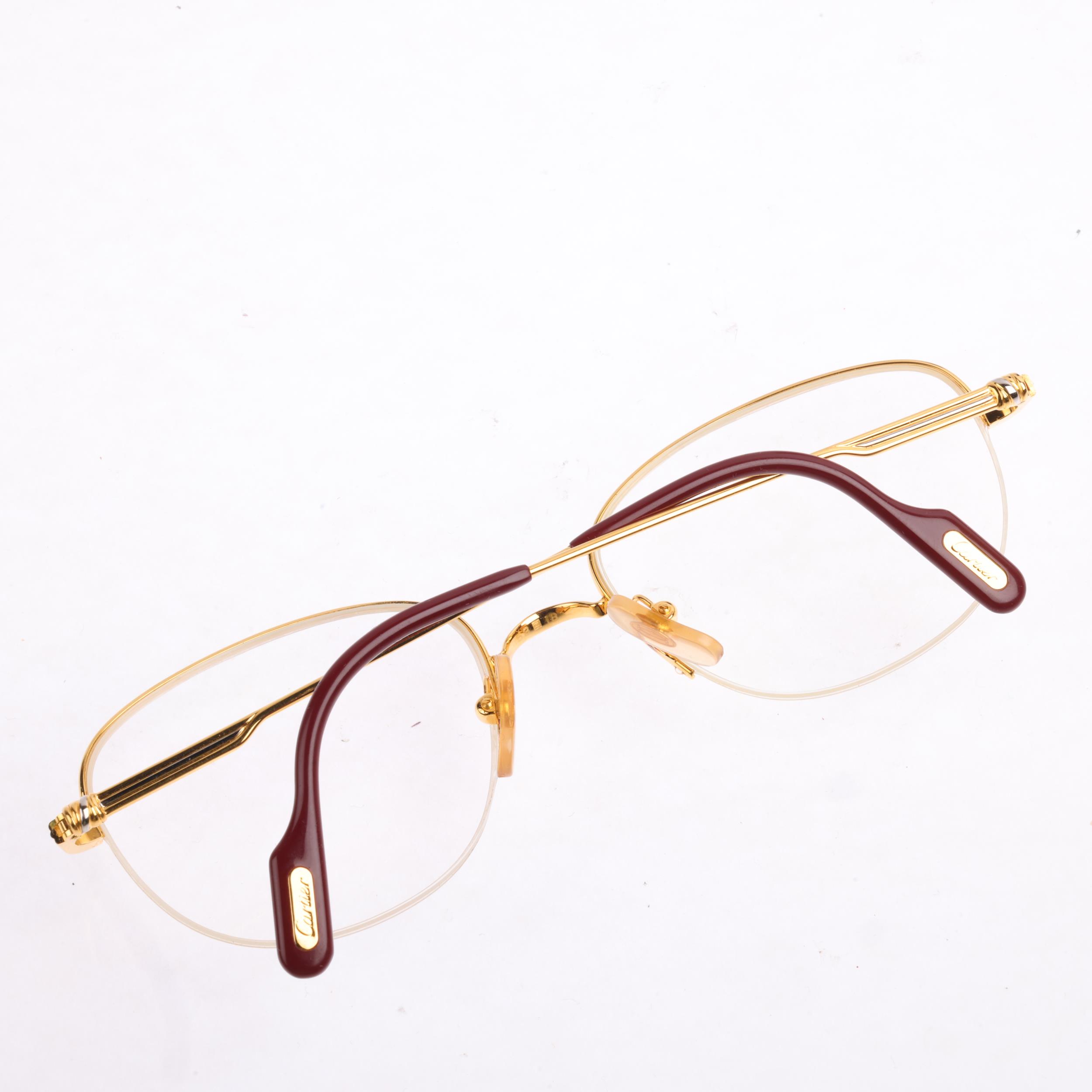 CARTIER - a pair of gold plated prescription glasses, size 135, signed Cartier Condition Report: - Image 2 of 3