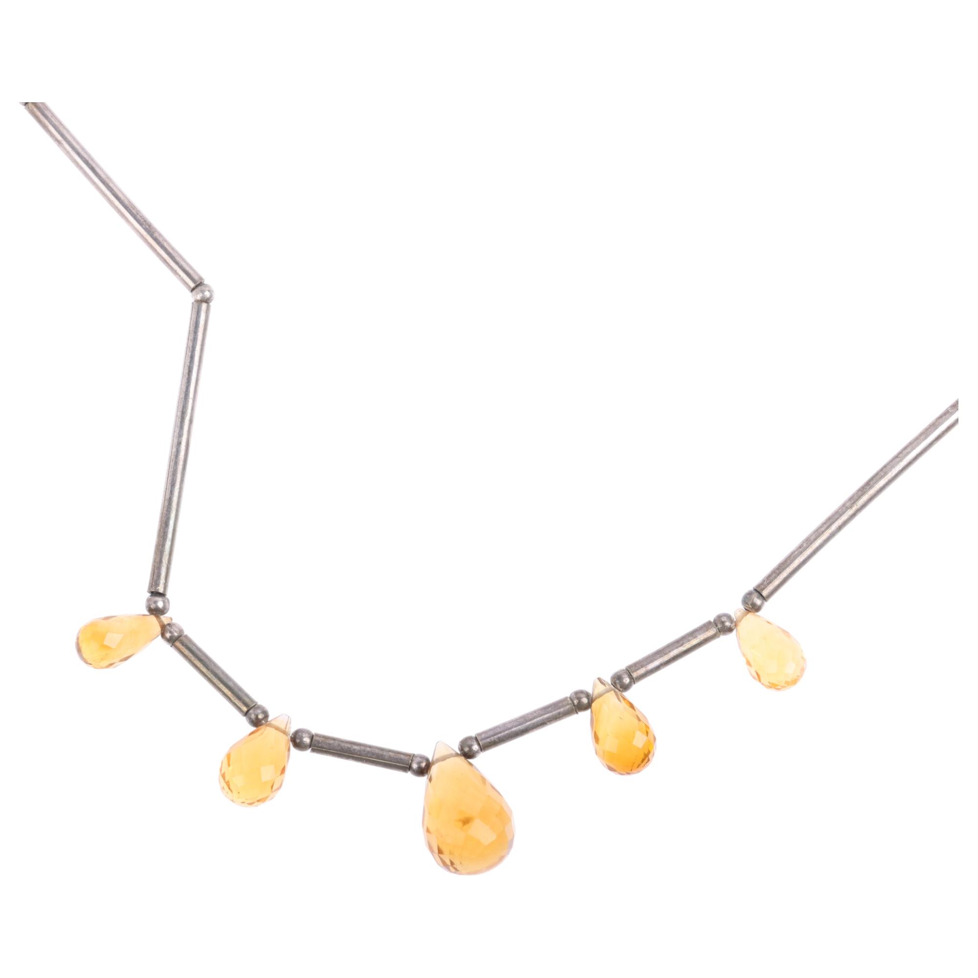 A modern sterling silver citrine fringe necklace, set with briolette-cut citrines, largest 14.1mm,