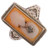 A Vintage shell cameo and diamond habille cameo ring, relief carved depicting female profile wearing