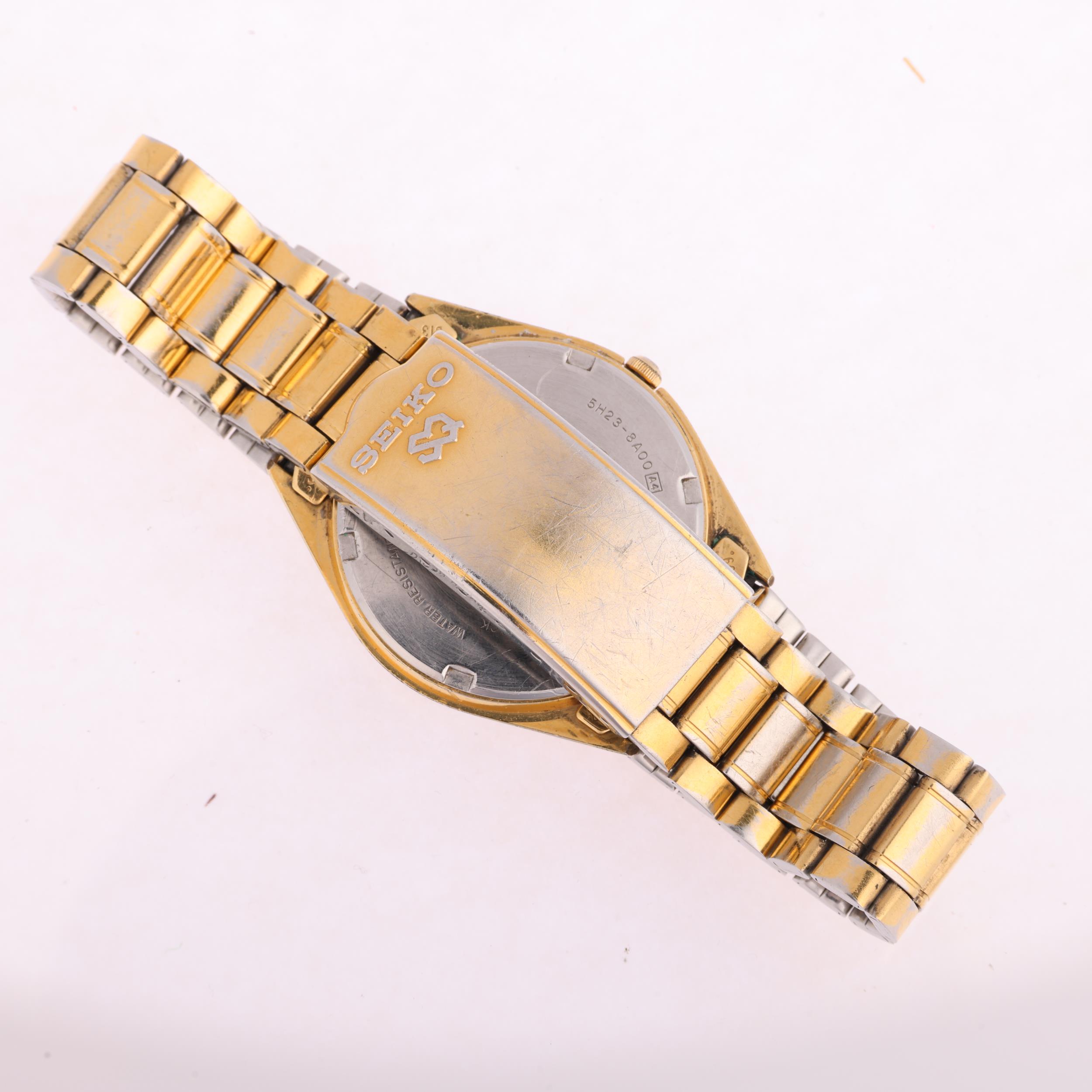 SEIKO - a gold plated stainless steel SQ quartz bracelet watch, ref. 5H23-8A00, champagne dial - Image 3 of 5