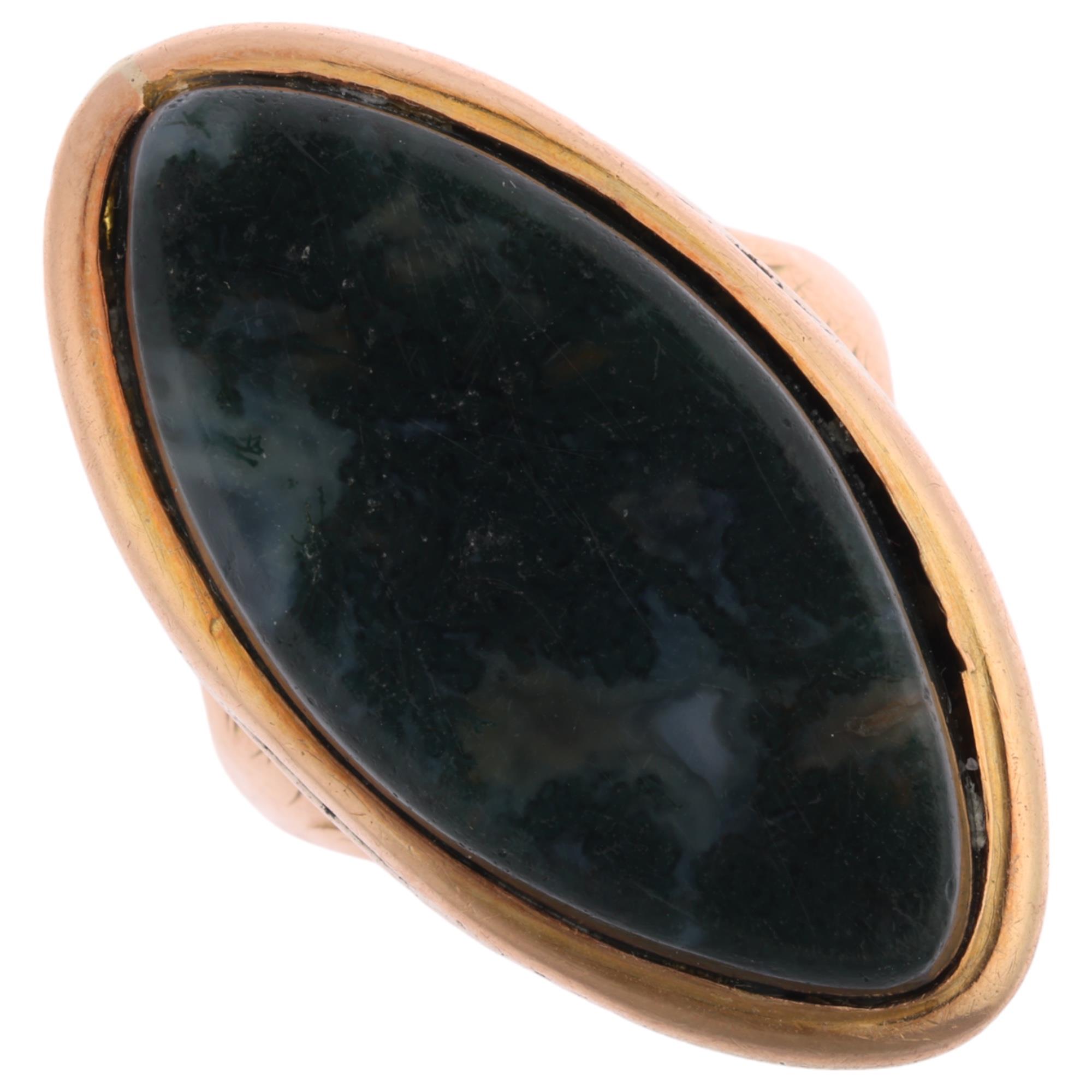 A Georgian moss agate marquise mourning ring, circa 1780, rub-over set with flat-top marquise-cut