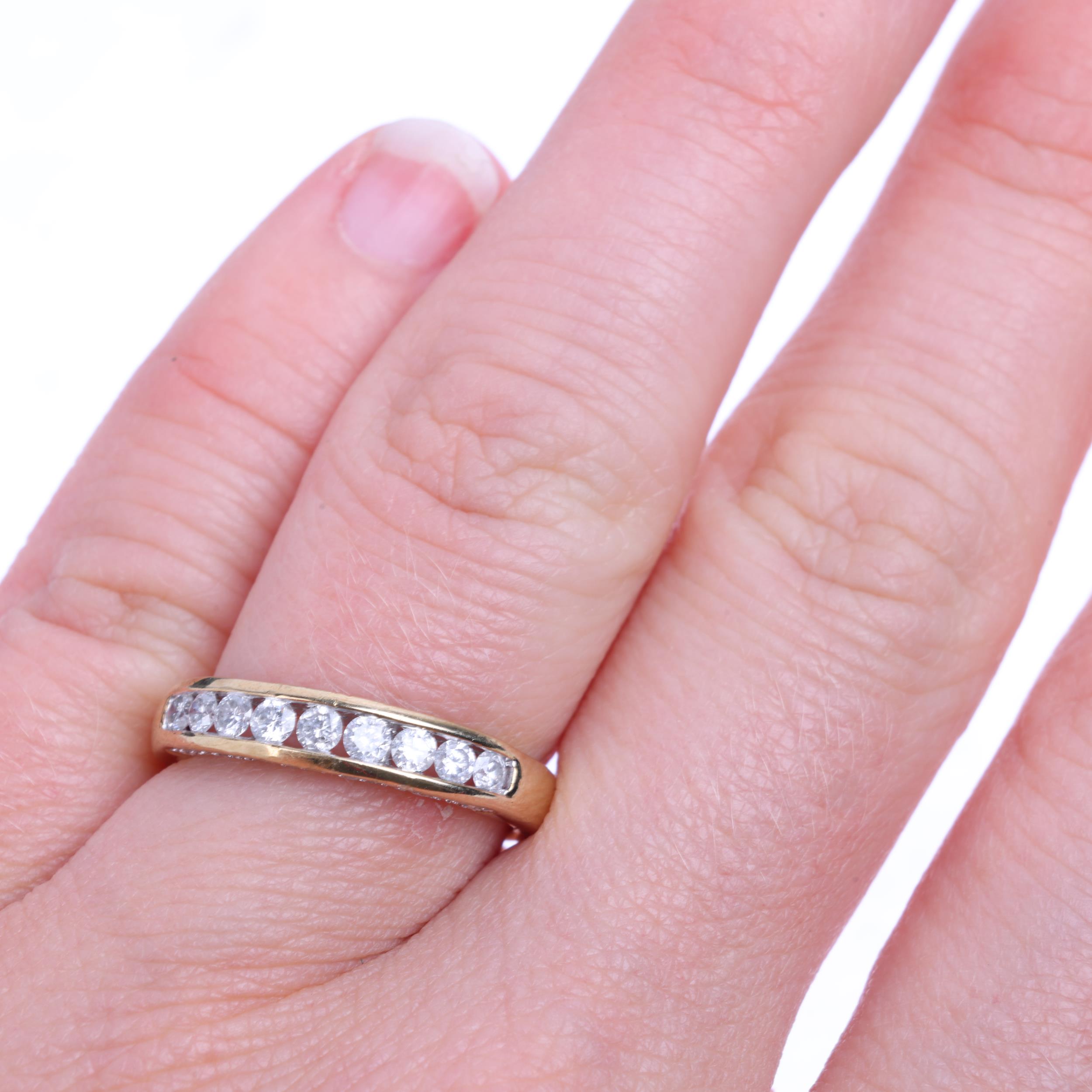 A modern 9ct gold half eternity ring, channel set with modern round brilliant-cut diamonds, total - Image 4 of 4