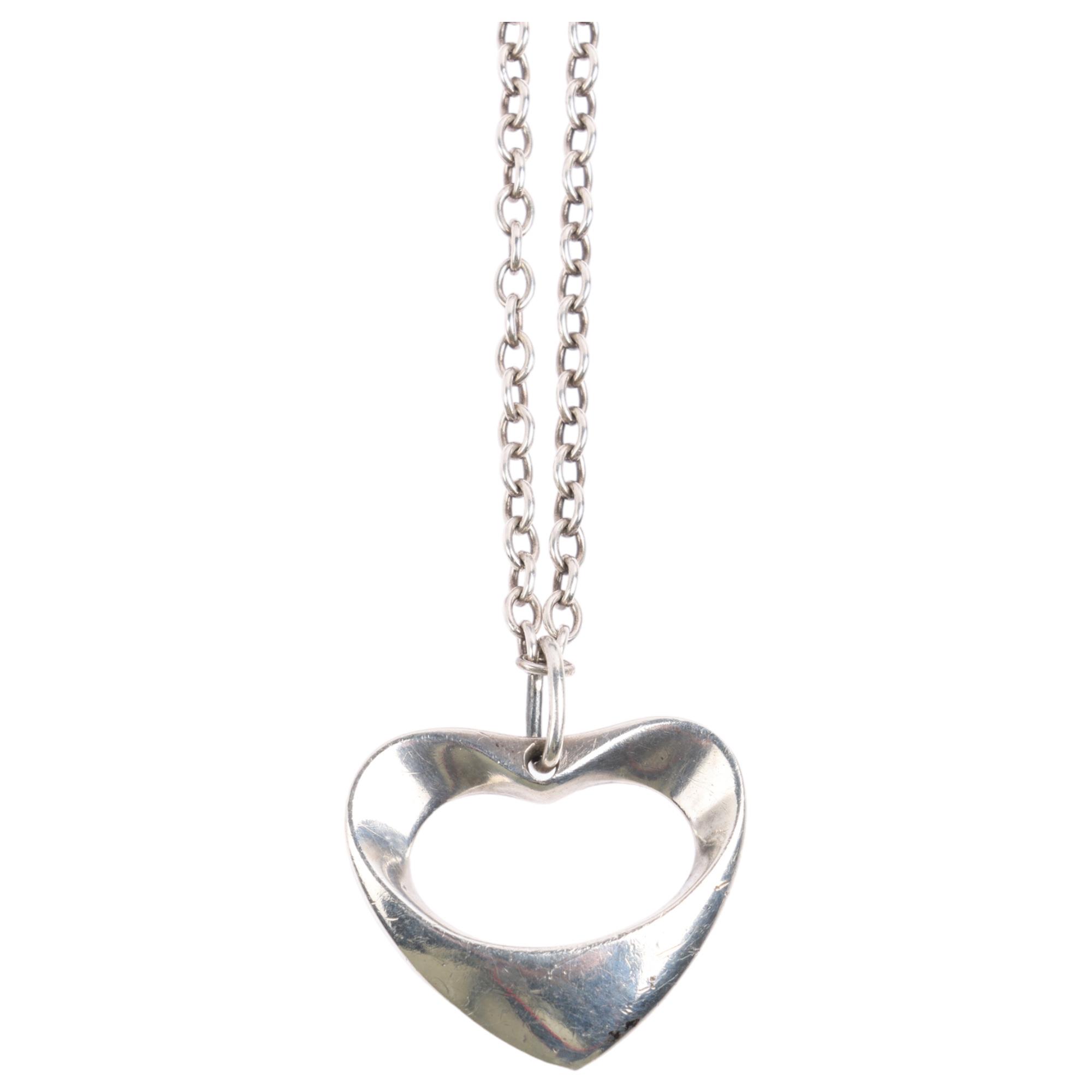 GEORG JENSEN - a Danish modernist sterling silver heart openwork pendant necklace, designed by
