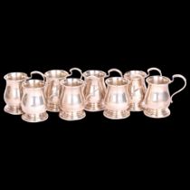 A cased set of 8 George V novelty silver miniature tankard drinking tots, Adie Brothers Ltd,
