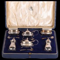 A cased George VI silver 6-piece cruet set, Mappin & Webb, Birmingham 1940, comprising 2 mustard