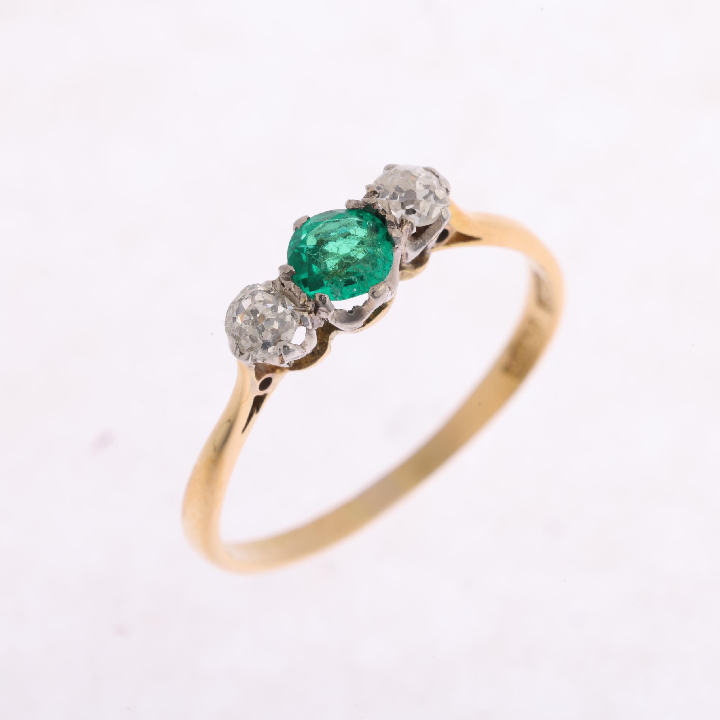 An Art Deco 18ct gold three stone emerald and diamond ring, platinum-topped set with round-cut - Image 2 of 4