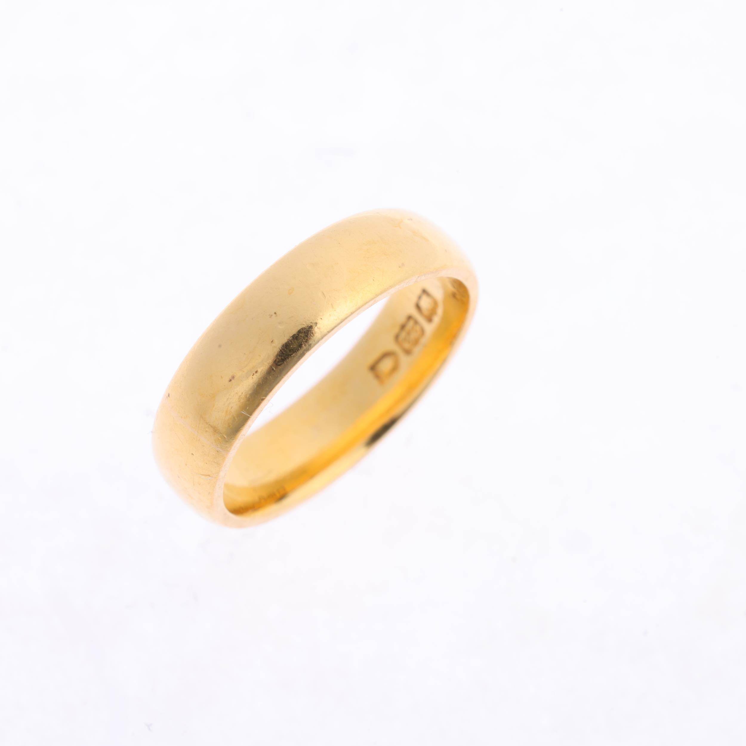A 22ct gold wedding band ring, no London date letter, band width 5.1mm, size L, 6.6g Condition - Image 2 of 4