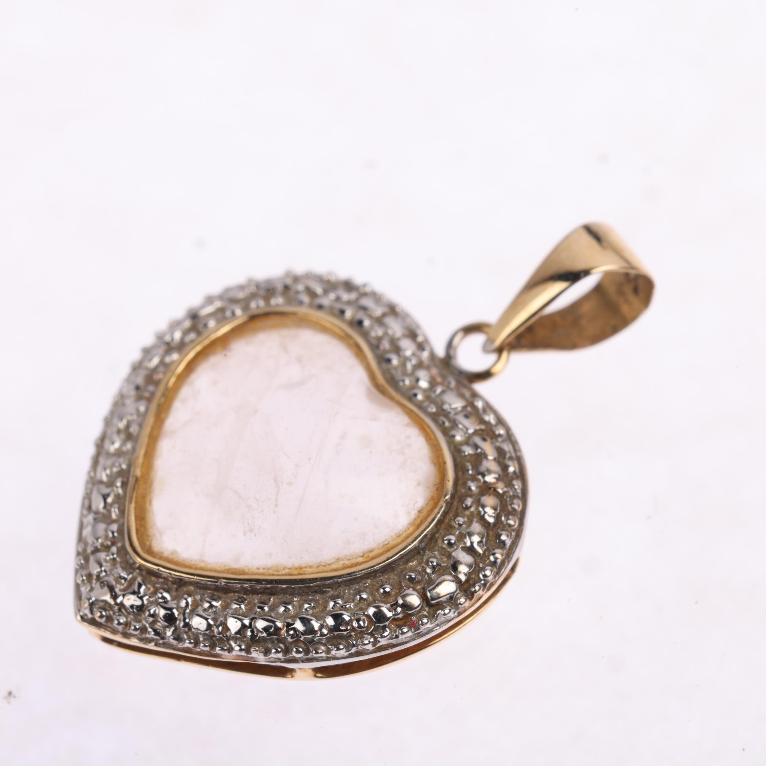 A 9ct gold moonstone heart pendant, 24.7mm, 2.3g Condition Report: No damage or repair, only light - Image 2 of 4