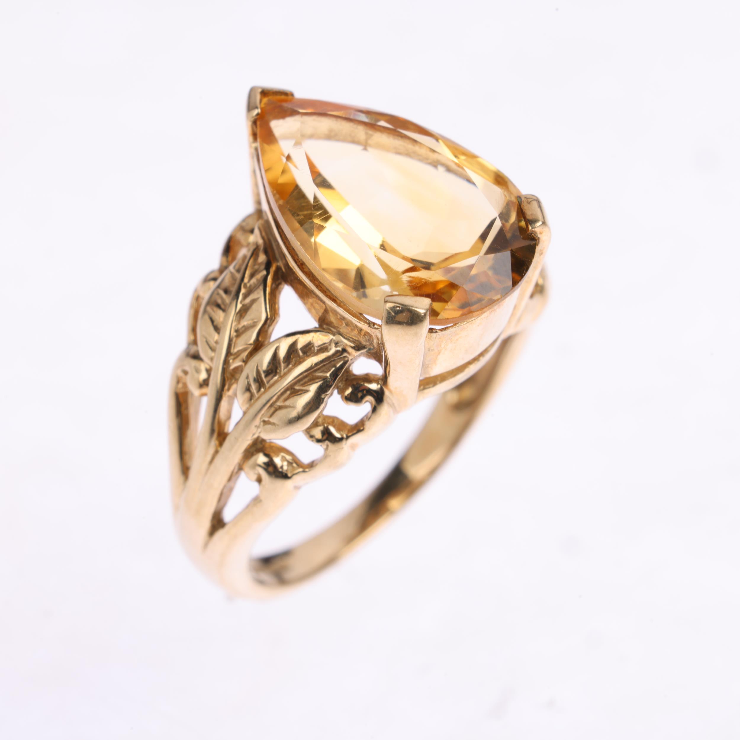 A 9ct gold citrine dress ring, maker GTV, Birmingham 2005, set with pear-cut citrine and floral - Image 2 of 4
