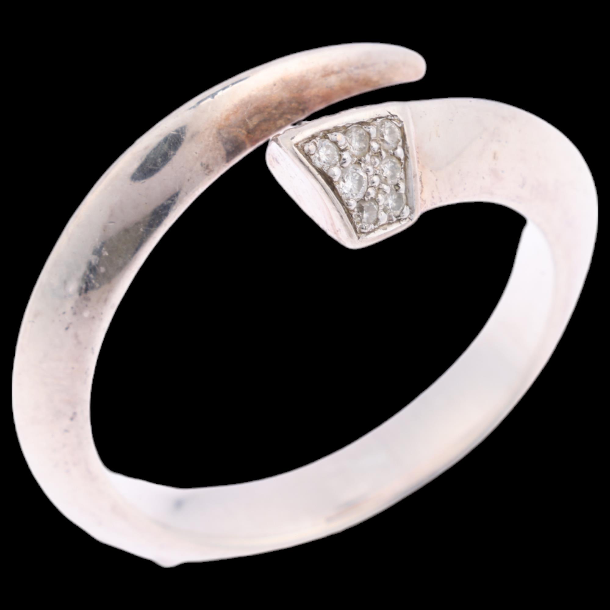 SHAUN LEANE - a sterling silver diamond sabre ring, set with modern round brilliant-cut diamonds,