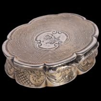 A Victorian silver vinaigrette, Edward Smith, Birmingham 1853, oval scalloped form with engine