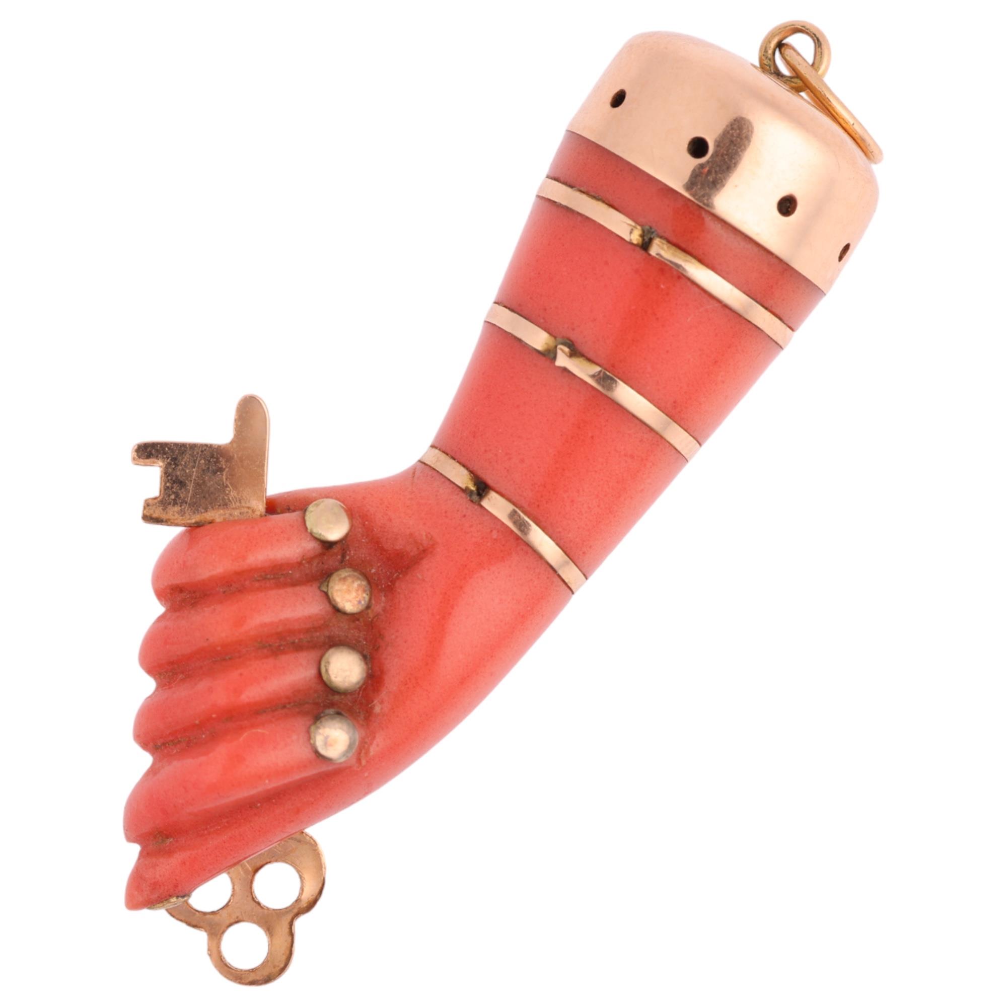 A Vintage reconstituted coral Figa hand pendant, modelled as a hand grasping a key, with unmarked - Image 2 of 4